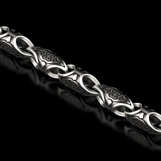 Oxidized scroll link chain with antique engraved patterns