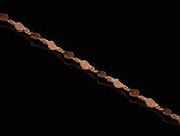 Rose gold plated silver necklace with ethnic swirl motif,