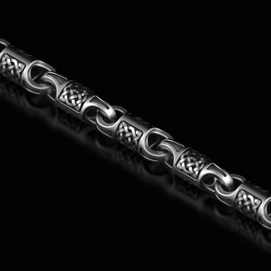 Close-up of oxidized Viking braided knot link