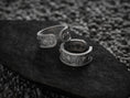 Load image into Gallery viewer, Pair of oxidized ancient Greek cuff rings on black stone
