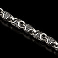 Load image into Gallery viewer, Close-up of oxidized Viking knot link in silver
