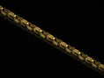Load image into Gallery viewer, 14 K gold vermeil scroll-link necklace laid flat
