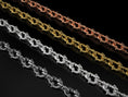 Load image into Gallery viewer, Silver fish chain necklace stacked for display
