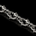 Load image into Gallery viewer, Close-up of fish-shaped silver chain links
