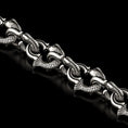 Load image into Gallery viewer, Close-up of fish-shaped silver chain links

