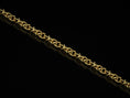 Load image into Gallery viewer, Gold-plated triangle link necklace on black background
