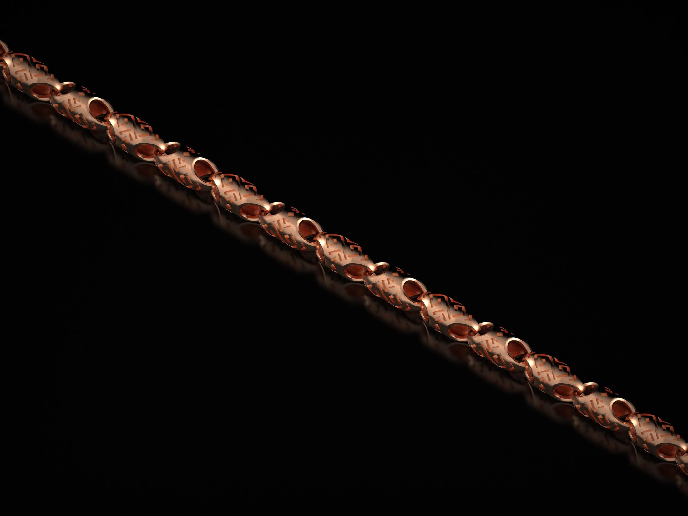 Chain detail in rose gold – intricate tribal etching