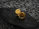 Elegant knight-style statement ring with symbolic design,