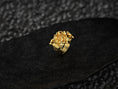 Bild in Galerie-Betrachter laden, “Gold-plated Spartan warrior trio signet ring on a black slate background, showing intricate hoplite armor and shield detail.”
