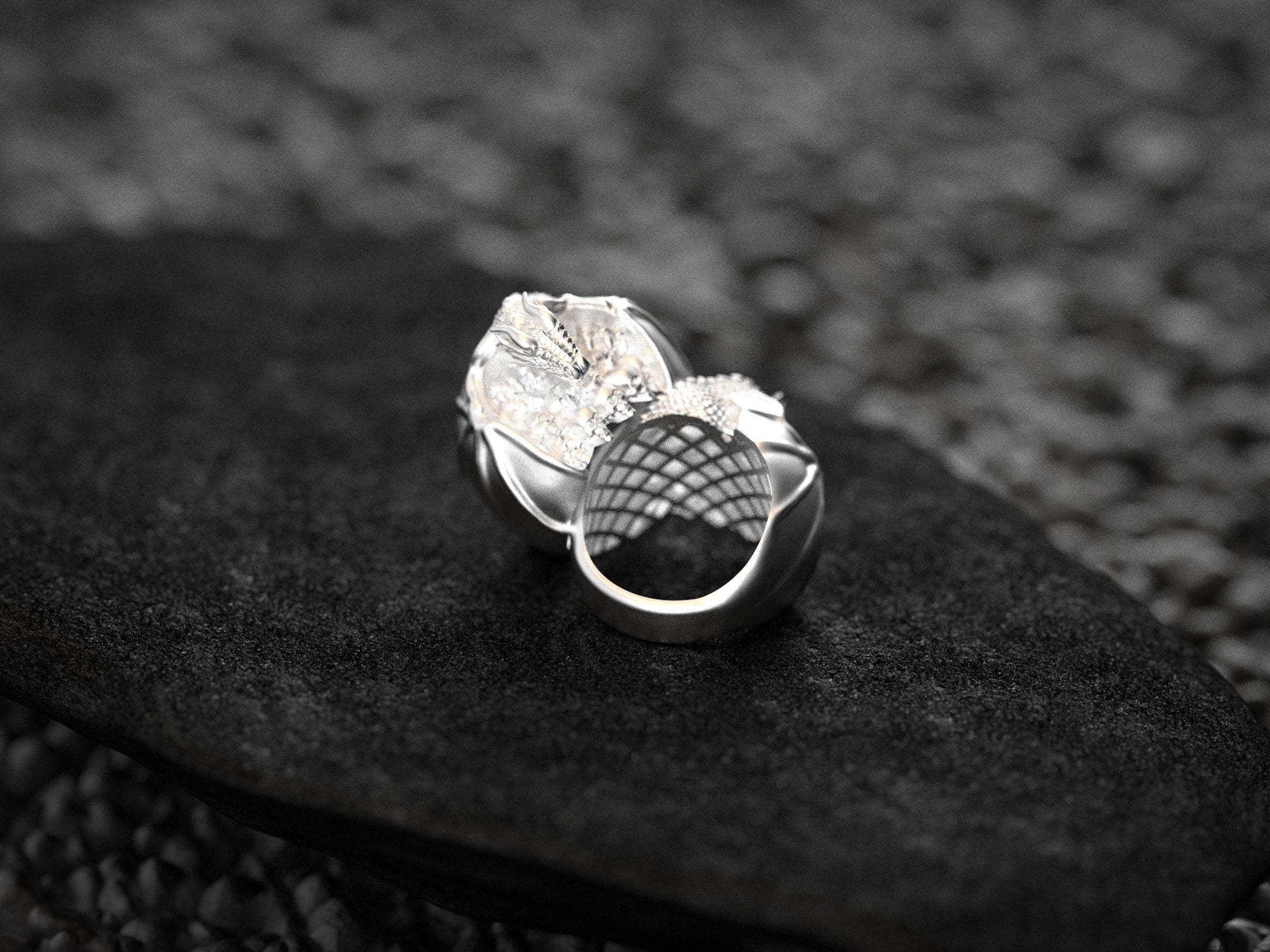 Rear interior view of silver skull pile ring.