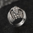 Load image into Gallery viewer, Front close-up of silver dragon skull signet ring.
