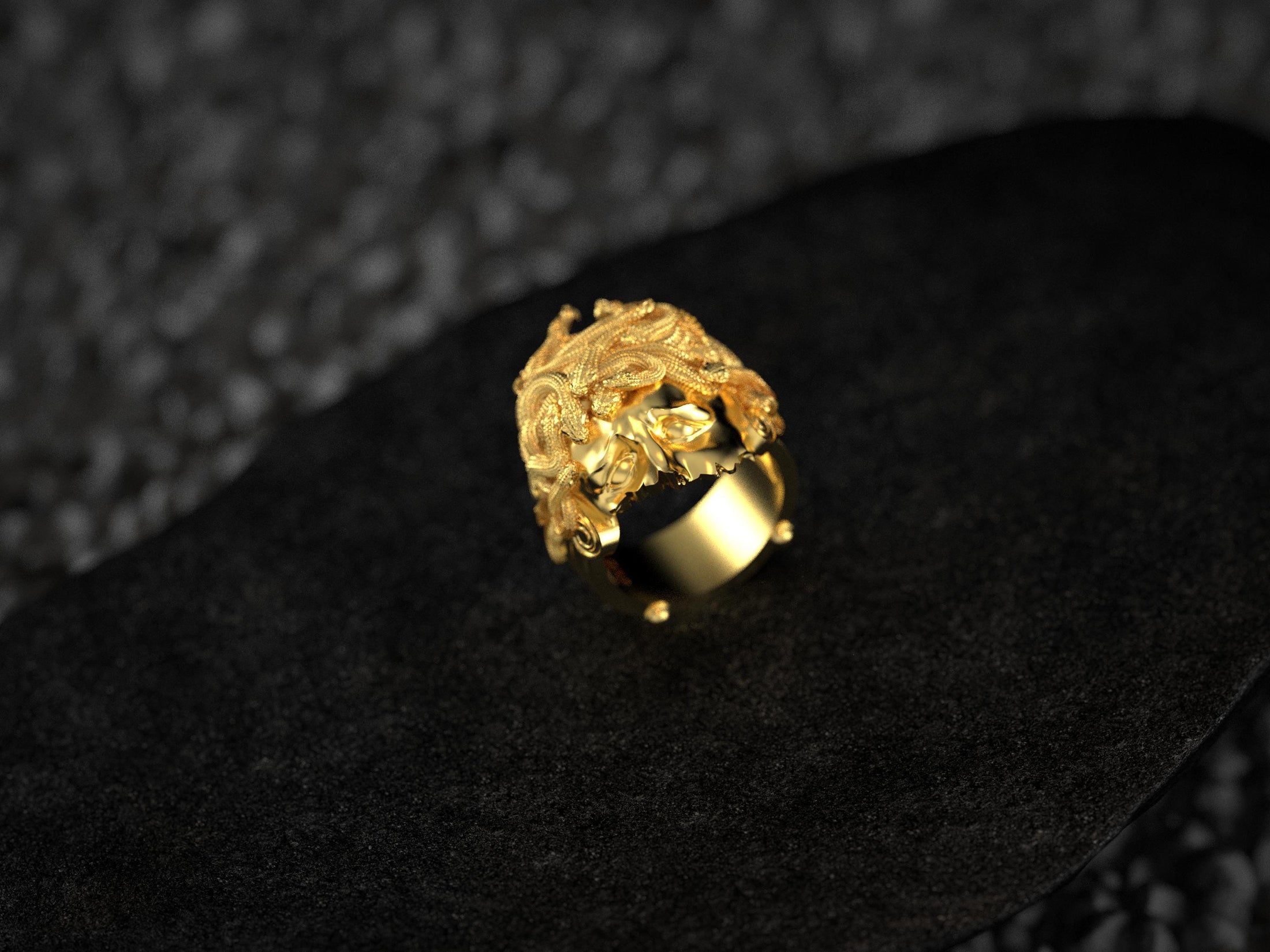 Rear interior view of gold-plated Medusa ring band.