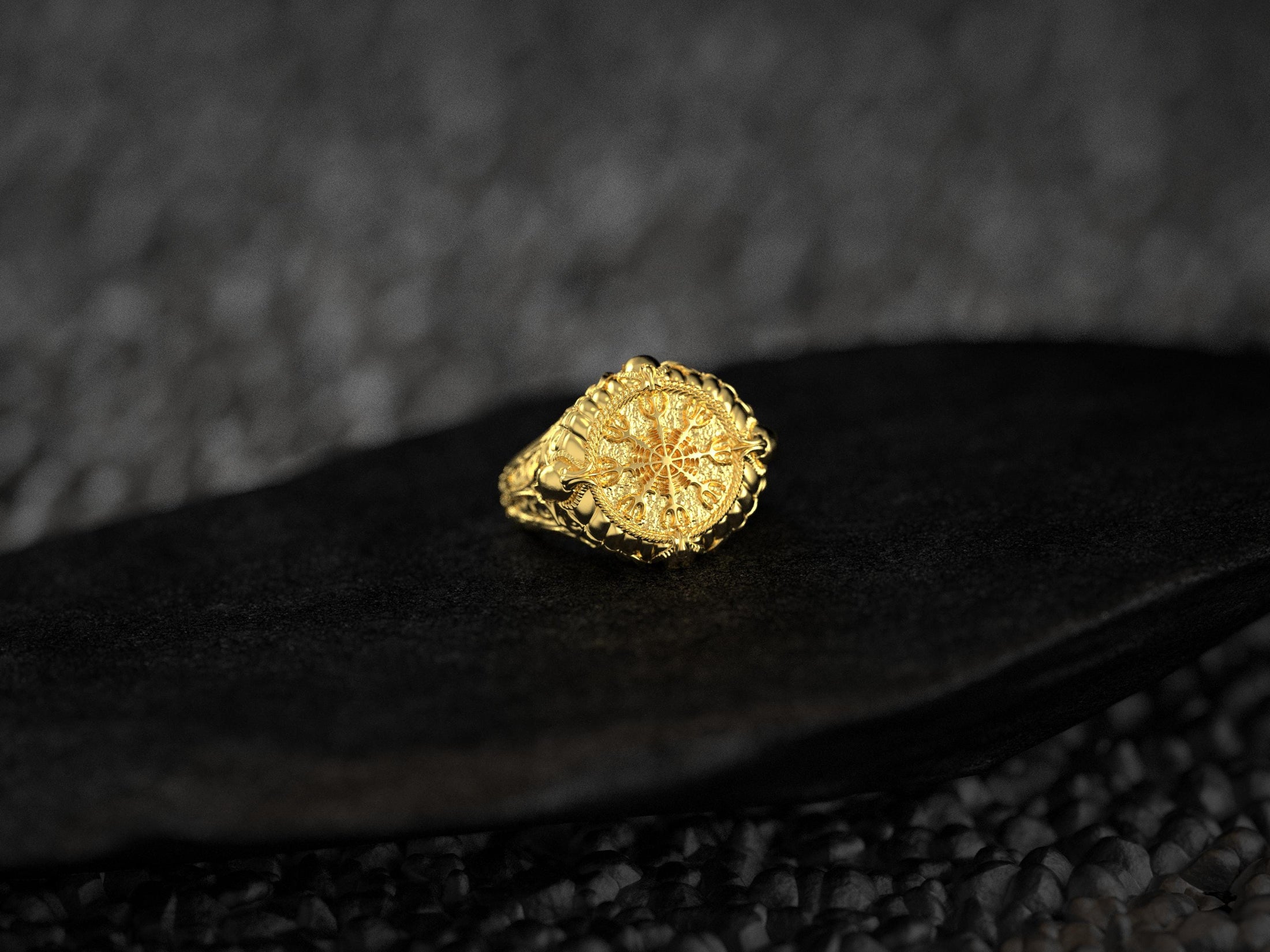 Front view of gold-plated Vegvísir ring variant.