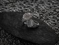 Load image into Gallery viewer, Side profile of silver ring band with Norse rune patterns.
