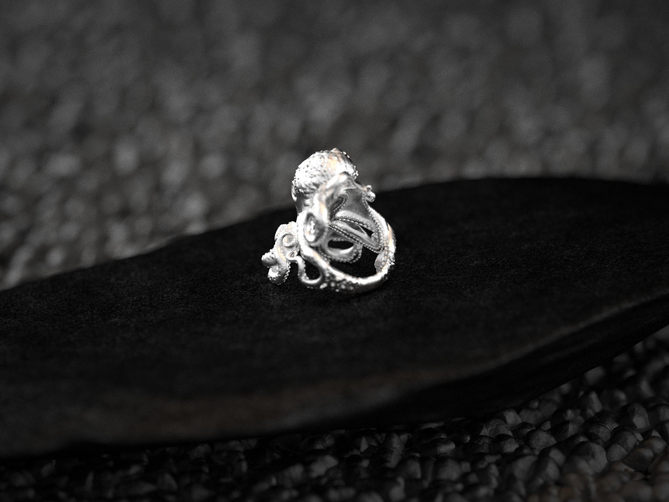 Interior engraving view of sterling silver octopus ring band.