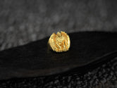 Front profile of gold-plated griffin signet ring variant.