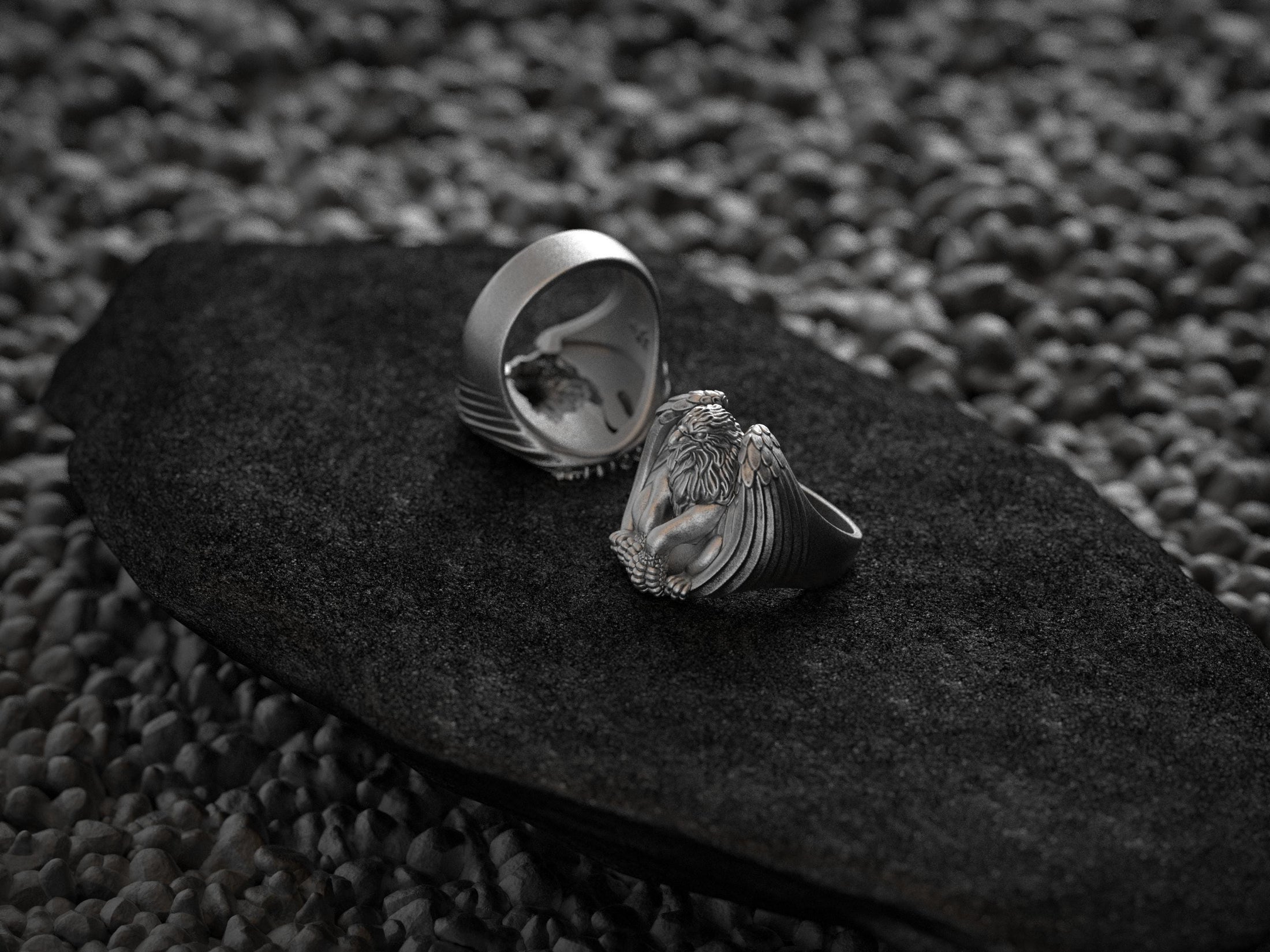 Interior engraving view of sterling silver griffin ring band.