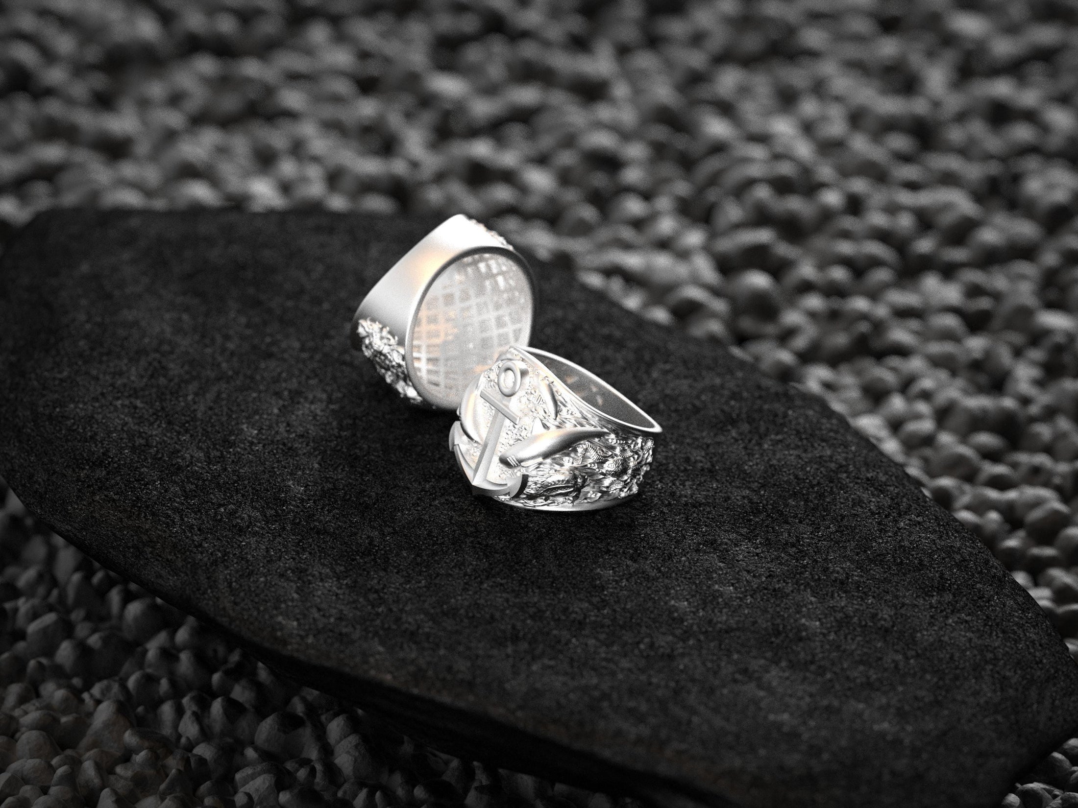 Interior engraving view of sterling silver band with maker’s mark.