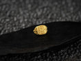 Load image into Gallery viewer, Front view of the 18K yellow gold–plated signet ring with engraved Jerusalem crosses in warm gold tones.
