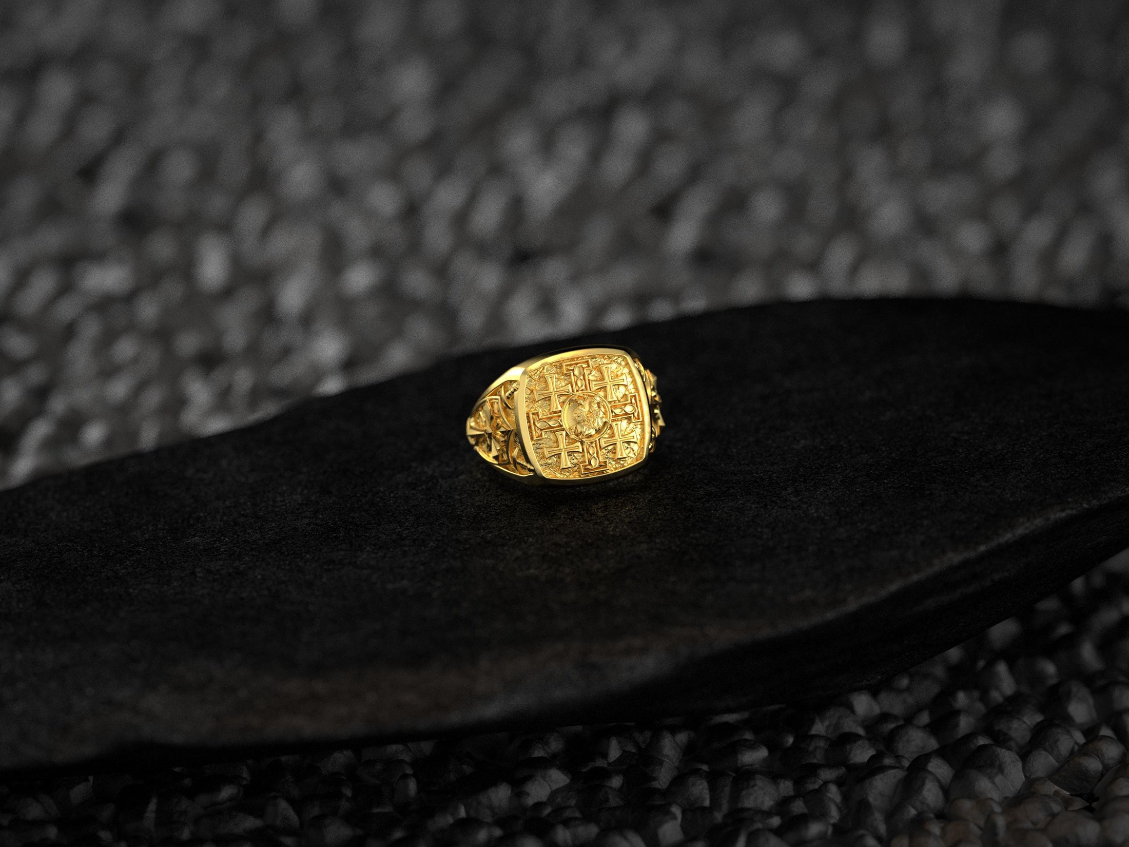 Front view of the 18K yellow gold–plated signet ring with engraved Jerusalem crosses in warm gold tones.