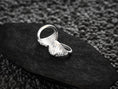 Load image into Gallery viewer, Interior band shot of the sterling silver ring revealing its comfort-fit grid pattern and hallmarks.

