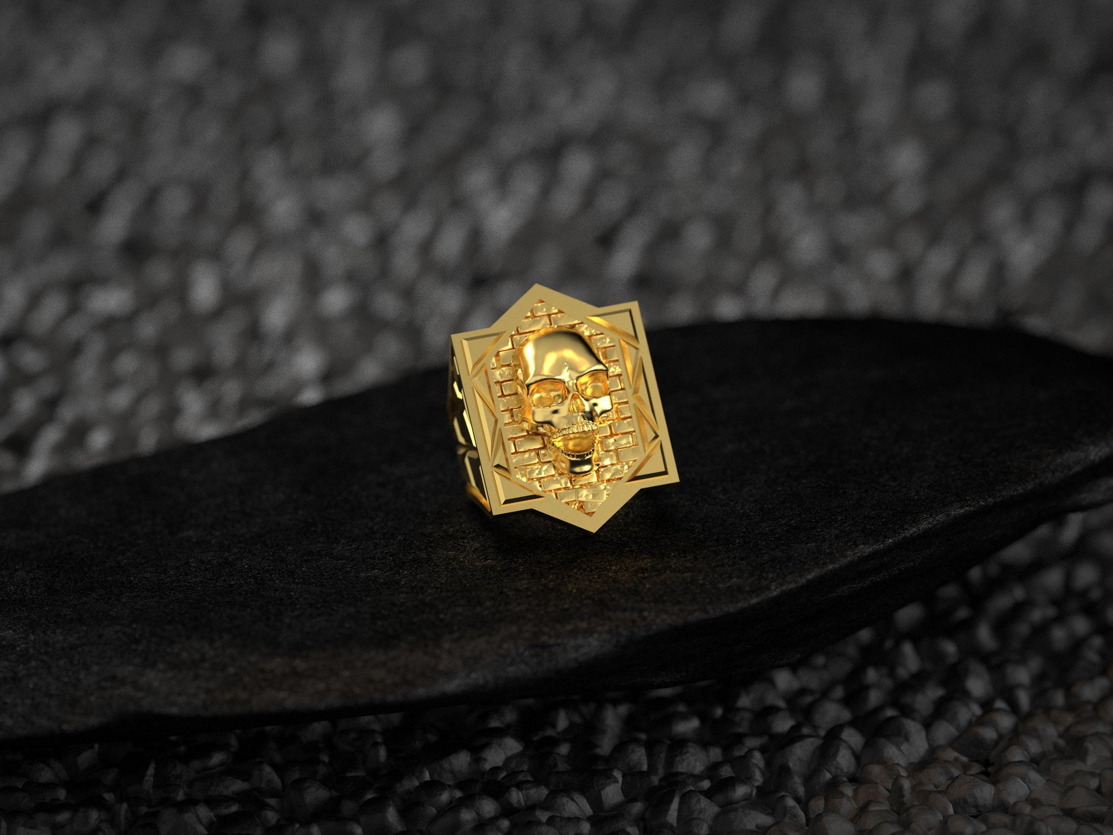 Front view of the ring plated in lustrous 18K yellow gold, emphasizing the hexagonal brickwork and polished band.