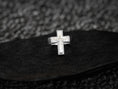 Load image into Gallery viewer, Close-up macro of the silver Christ relief, highlighting the textured radiating background within the cross arms.
