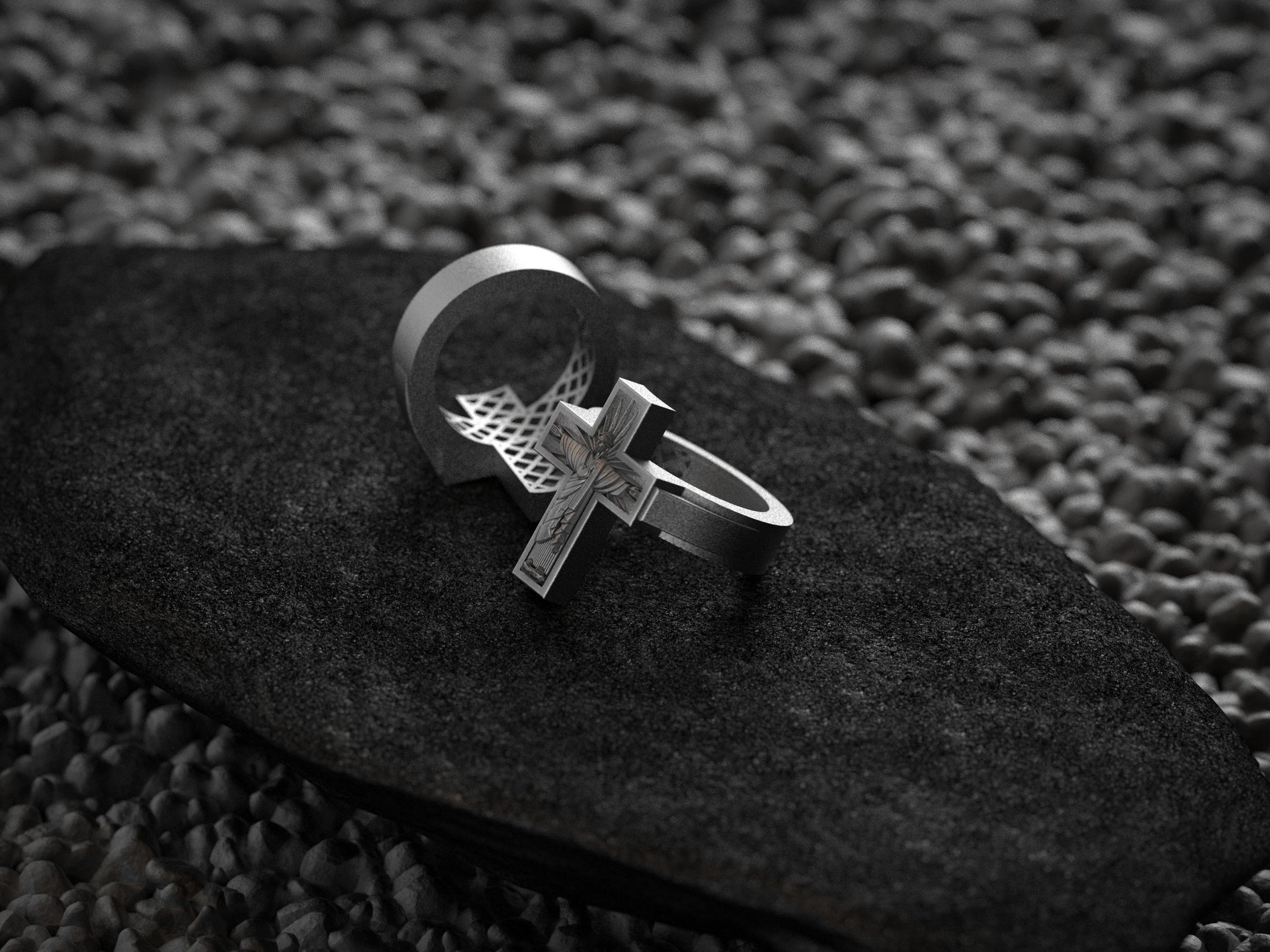 Three-quarter angled shot of the silver ring, displaying the thick comfort-fit band tapering into the detailed cross face.