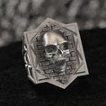 Load image into Gallery viewer, Front-on view of the sterling silver Gothic skull signet ring showing the detailed 3D skull against a brick-patterned hexagon frame.
