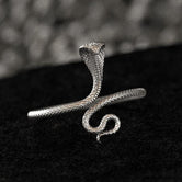 Sterling Silver Adjustable Cobra Snake Ring on black velvet background