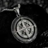 Close-up of 925 sterling silver personalized compass pendant necklace