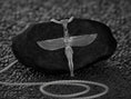 Load image into Gallery viewer, Close-up of Egyptian goddess necklace with intricate wing design.
