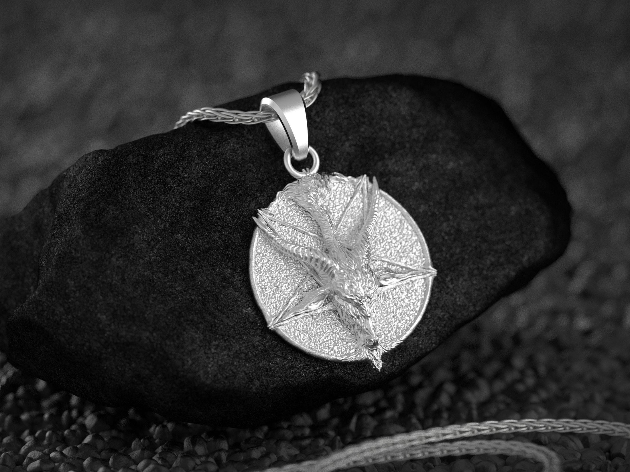 Dark gothic pendant in rhodium plated finish.