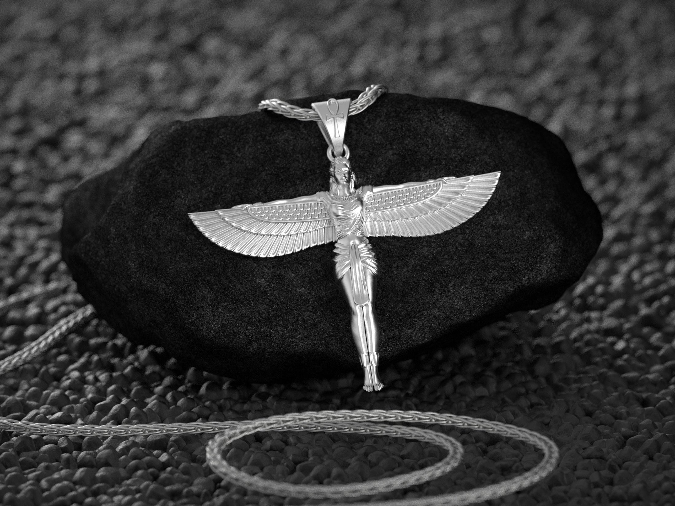 Silver Isis goddess necklace with wings and Ankh symbol.
