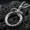 Load image into Gallery viewer, Rhodium plated ouroboros dragon pendant close-up texture
