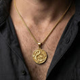 Load image into Gallery viewer, Gold plated dragon medallion necklace worn by model mythological dragon pendant men jewelry
