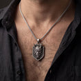 Load image into Gallery viewer, Oxidized oni mask dragon dog tag pendant necklace worn on male model as a guardian talisman
