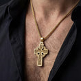 Load image into Gallery viewer, Gold plated celtic cross necklace worn by man as meaningful religious jewelry
