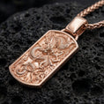 Load image into Gallery viewer, Rose gold plated chinese dragon dog tag necklace showcased on volcanic rock surface
