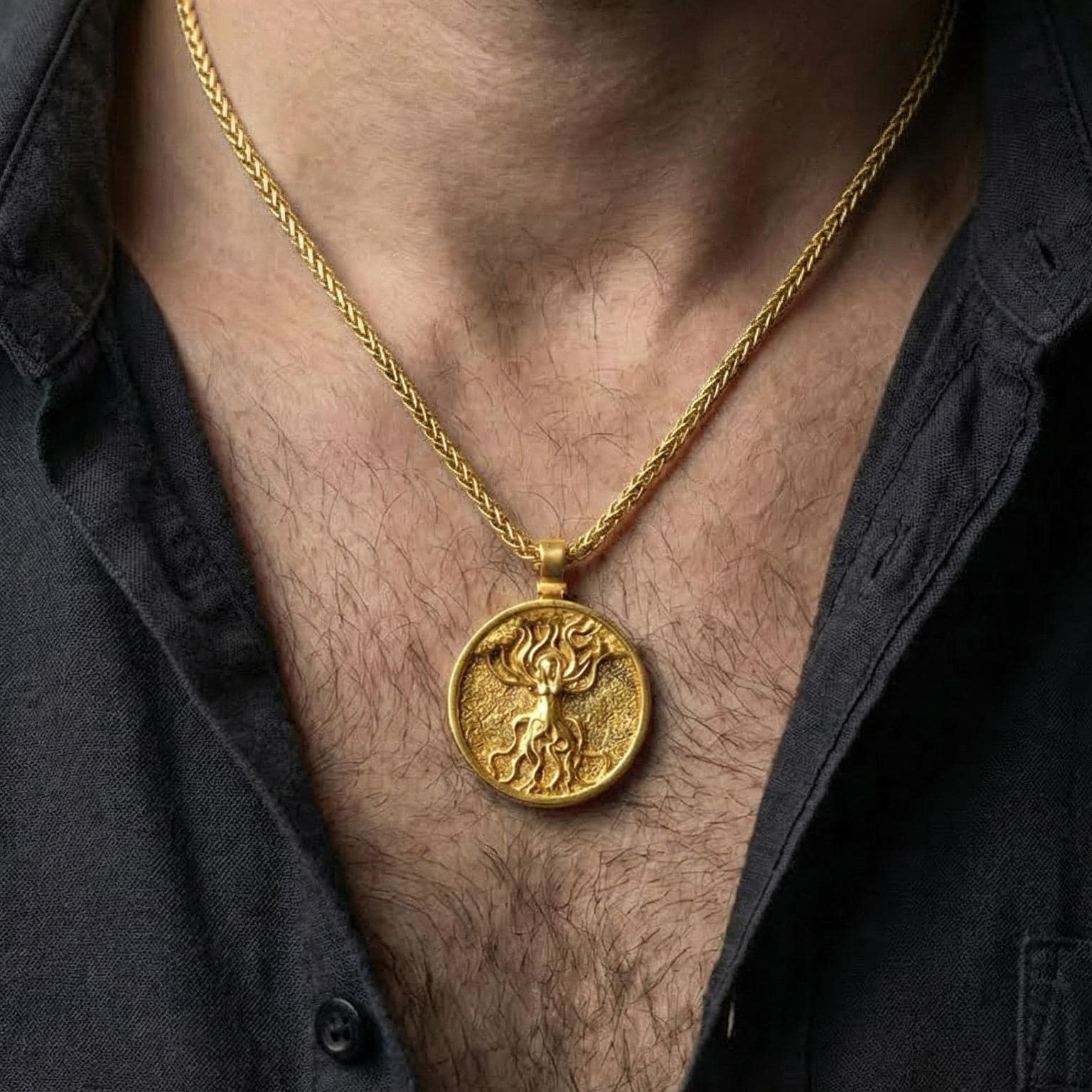 Gold plated tree of life pendant necklace worn as meaningful nature inspired statement jewelry