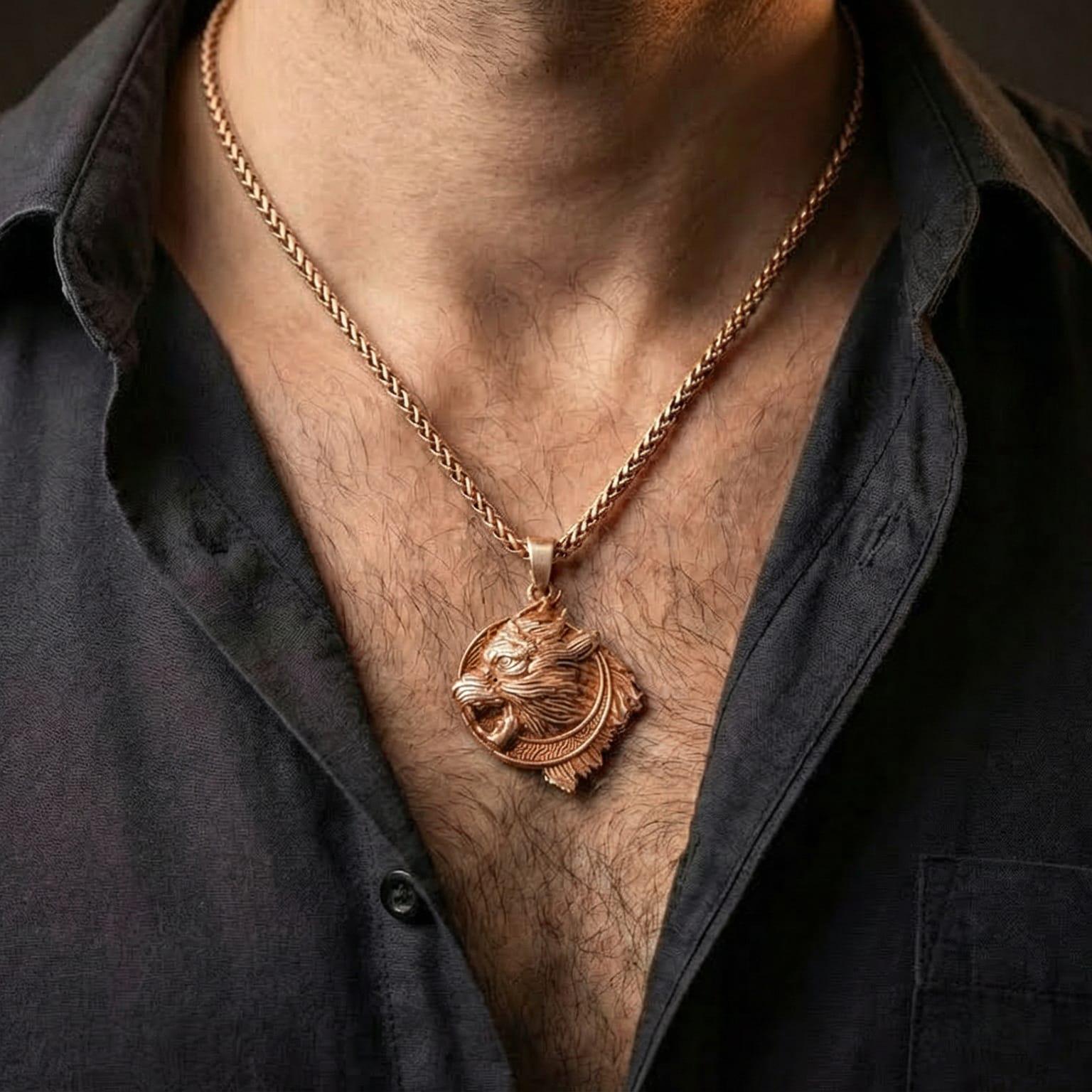 Rose gold plated Norse wolf pendant worn on model with masculine mythic warrior style