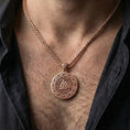 Load image into Gallery viewer, Rose gold plated Norse rune Valknut necklace worn on model with powerful mythic warrior style

