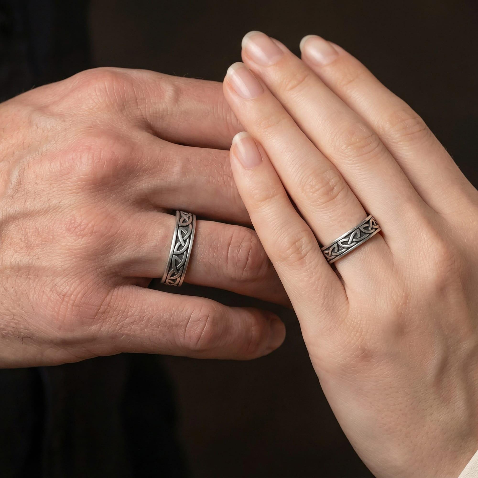 Oxidized Celtic knot ring worn on finger as a timeless symbol of eternal bond and strength