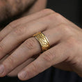 Load image into Gallery viewer, Rose gold plated Celtic braid ring worn on model with refined romantic tone, symbolic unity, and elevated unisex styling
