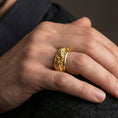 Load image into Gallery viewer, Gold plated dragon koi style spinner ring worn by man as a bold prosperity statement ring with rotating band design
