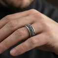 Load image into Gallery viewer, Oxidized spinner fidget Greek crowd band ring worn on finger as a bold history-inspired statement wedding band
