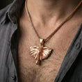 Load image into Gallery viewer, Rose gold plated elephant pendant necklace worn on neck, lifestyle composition with dark clothing, crisp elephant silhouette

