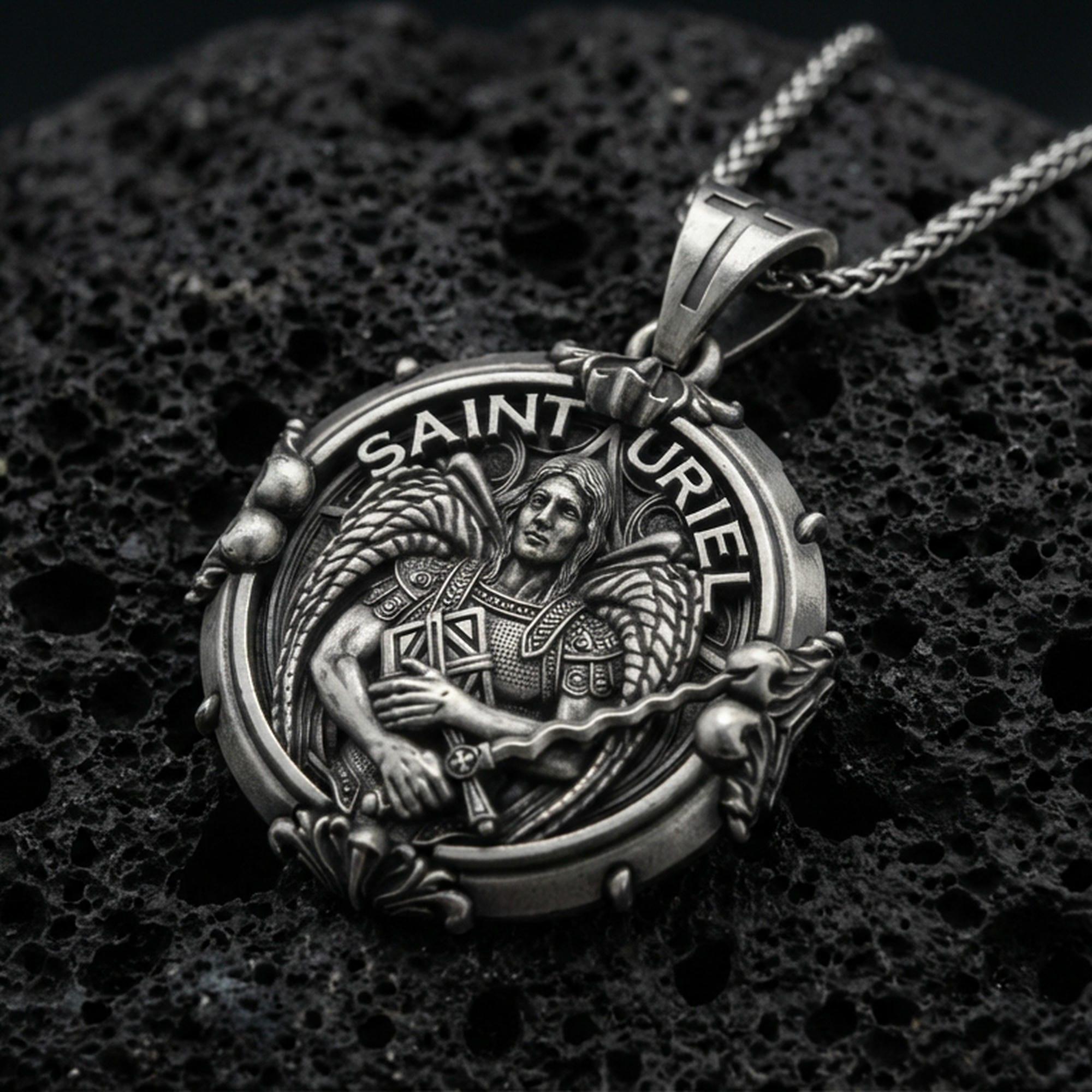 Oxidized Saint Uriel pendant on textured volcanic rock, macro close-up, angel warrior medallion detail, premium studio lighting