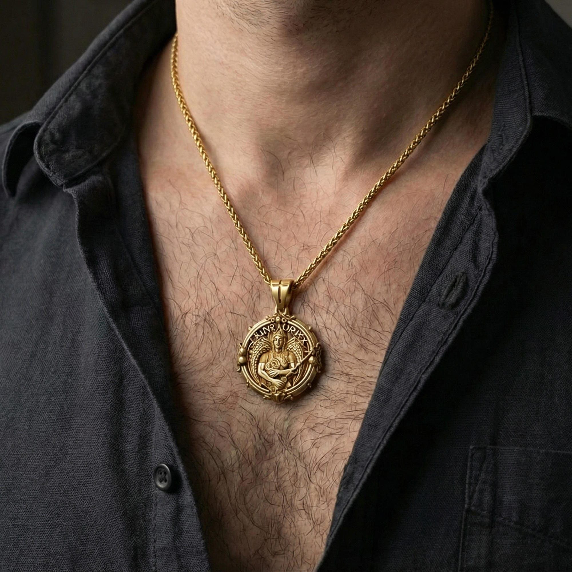 Gold plated Saint Uriel necklace pendant worn on neck, close-up lifestyle shot, luxury lighting with refined metallic highlights