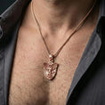 Load image into Gallery viewer, Rose gold plated Archangel Michael pendant necklace worn on neck, lifestyle composition with dark clothing, crisp shield silhouette
